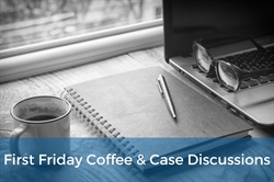 [ai] A cup of coffee next to a notebook and a pen on a wooden table, with a laptop and glasses in the background. The image features a text overlay stating 'First Friday Coffee & Case Discussions.'